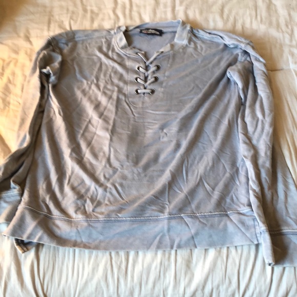 A light blue long sleeve. - Picture 1 of 3
